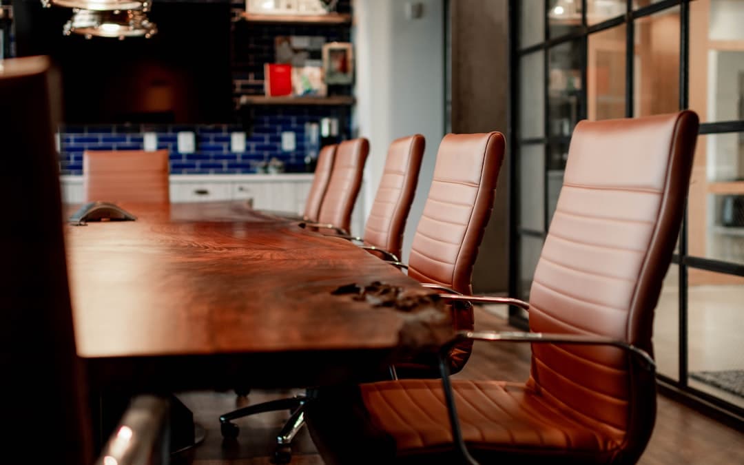 Conference room with professionals discussing AI governance strategy